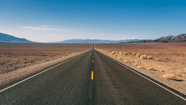 From towering sandstone cliffs, to geothermal wonders, to North America’s tallest peak, here’s how to hit the road through several U.S. National Parks